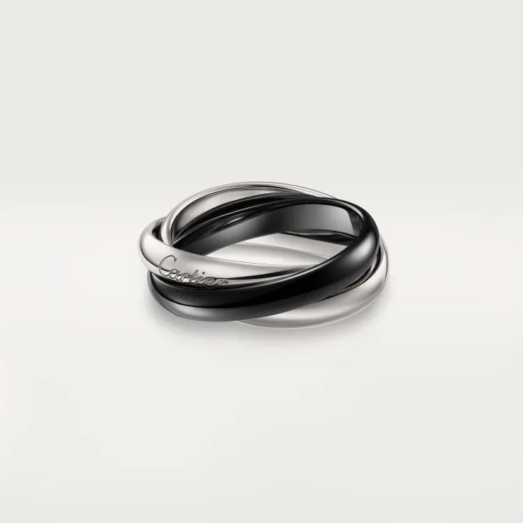 Three stackable geometric U-shaped sterling silver couple rings on a finger, showing gold rose silver finish.