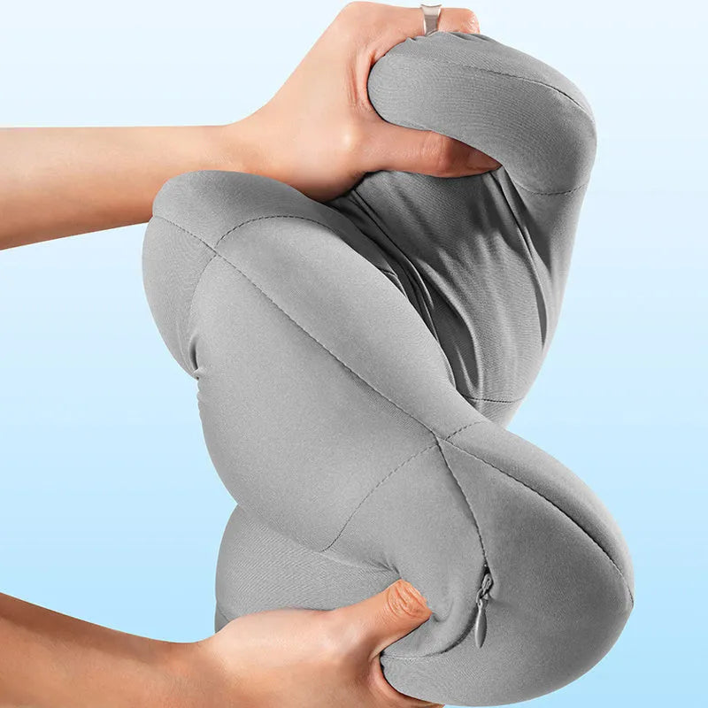 Grey and orange car head rest and waist pillow set with memory cotton filler on a car seat.