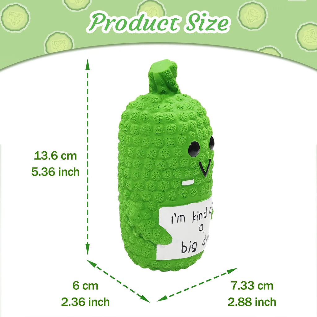 Green pickle-shaped dog chew toy with textured surface and squeaker for teething puppies