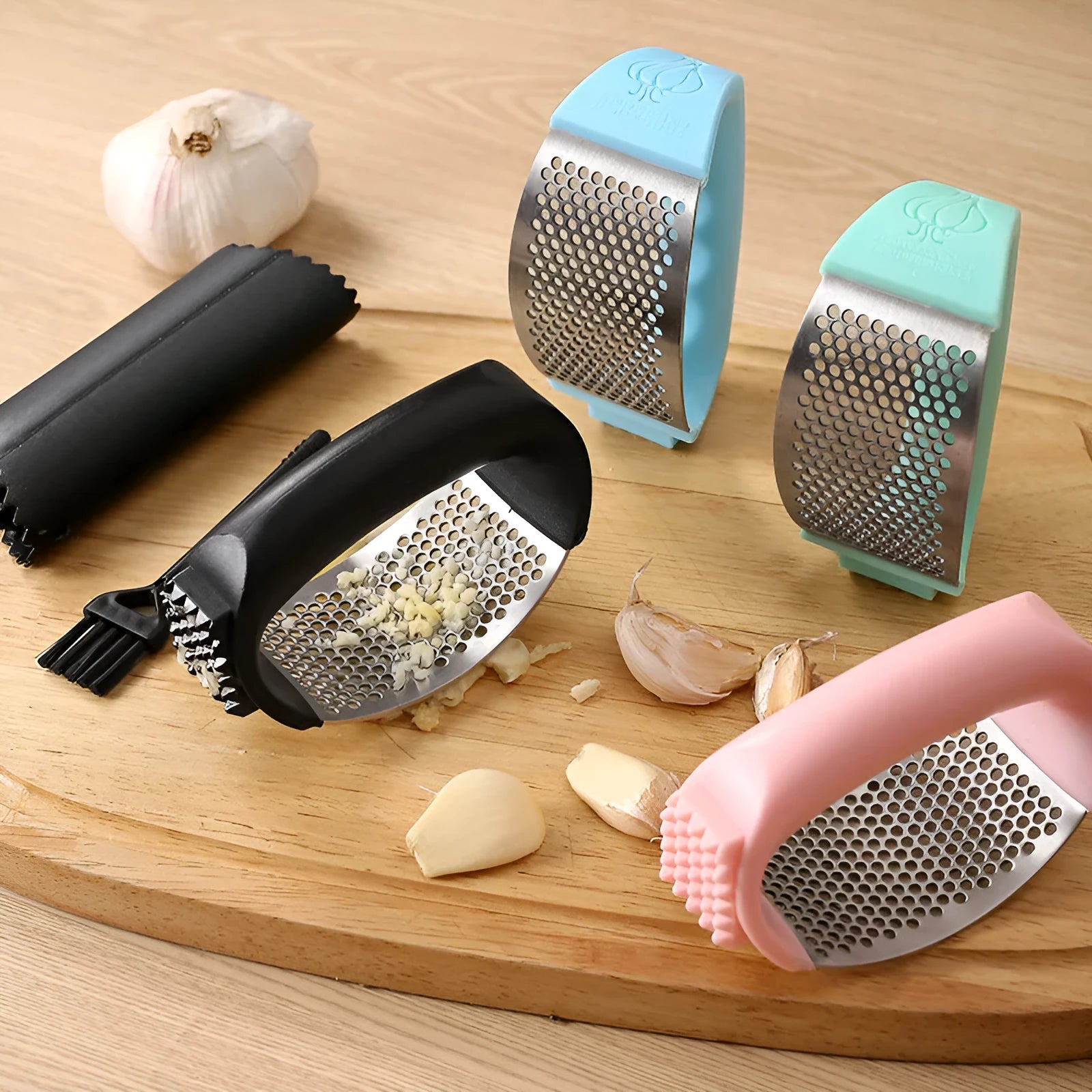 304 stainless steel garlic press with PP handle in 11cm size on kitchen counter