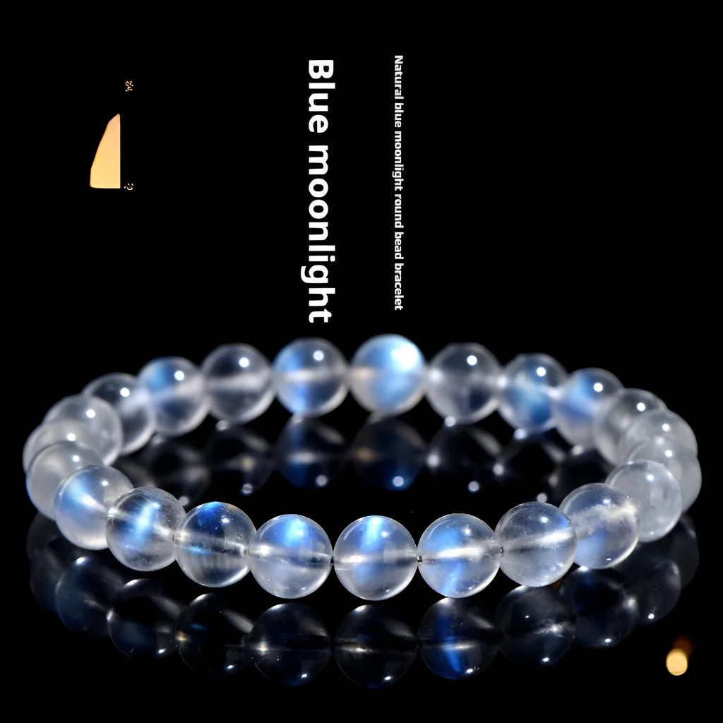 Natural cream body blue moonlight crystal bracelet on a wrist, showing single circle format.