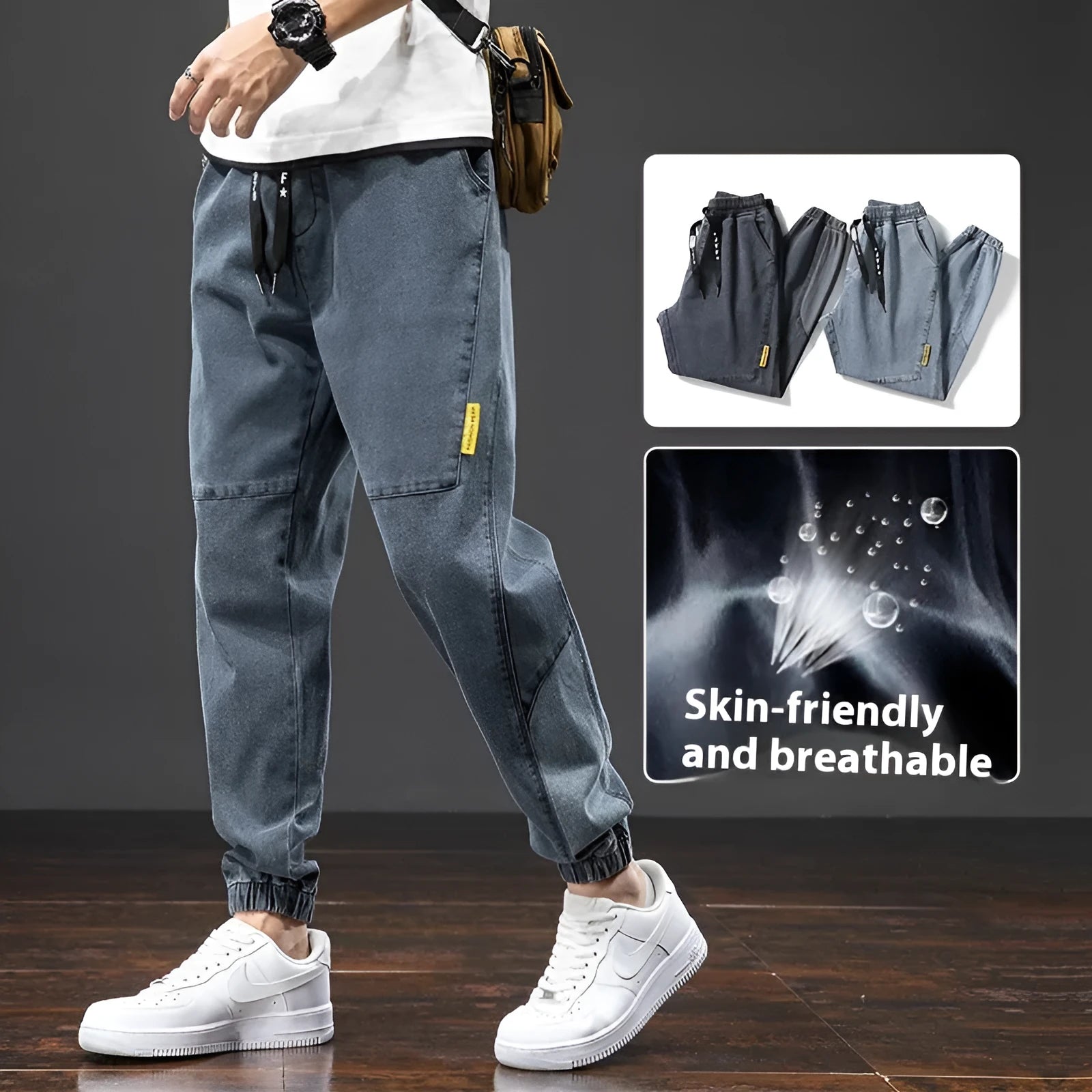 Men's loose fit blue cargo jeans with straight leg and cargo pockets on a plain background.