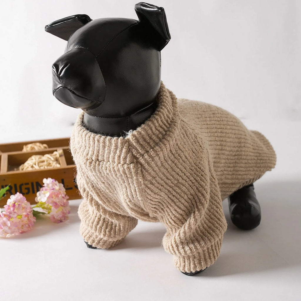 Brown knitted dog sweater pullover on small dog showing cloth construction and casual style
