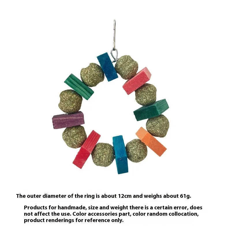 Hamster toy with applewood chew rod and decorative straw ball rings for small animal enrichment