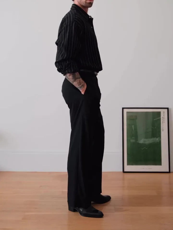 Man's black and white pinstriped long sleeve formal button-down shirt