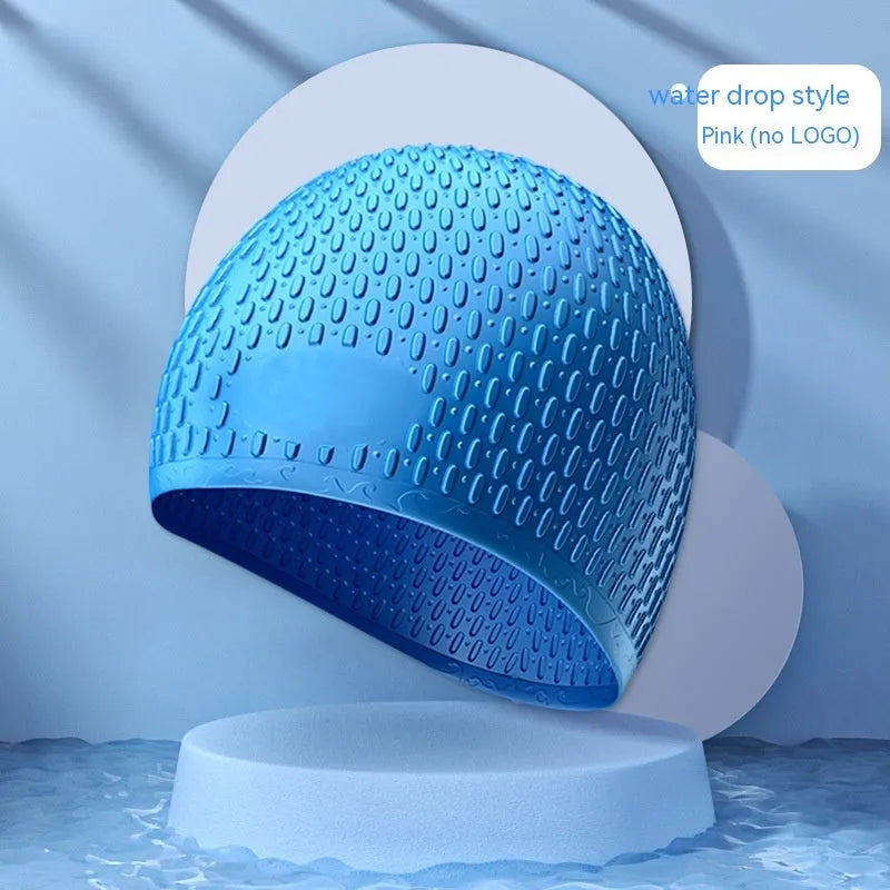 Silicone swimming cap for adults in various solid colours on a white background.