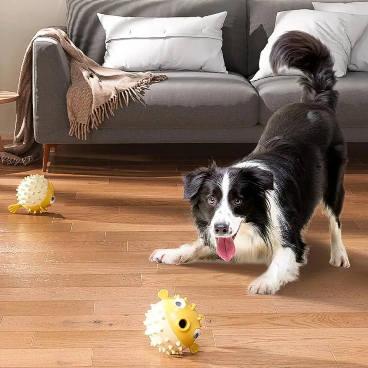 Yellow fish shaped vinyl dog chew toy with textured surface for teeth cleaning