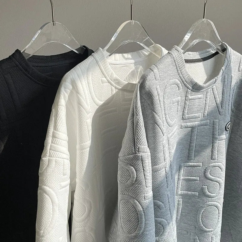 Men's grey loose fit T-shirt with a three-dimensional retro letter pattern on the front.