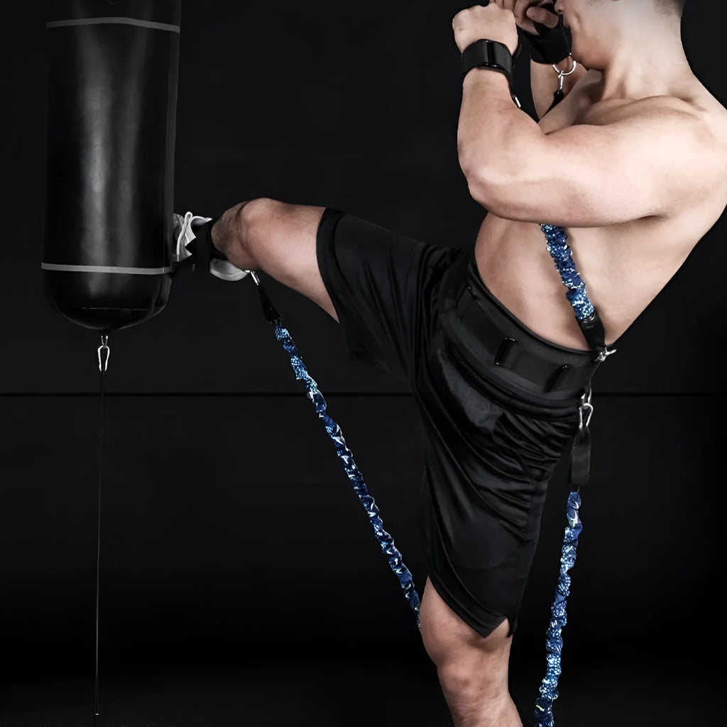 Chest expander elastic belt with red, blue, black, and green resistance sleeves indicating 100lb to 300lb TPE tube.