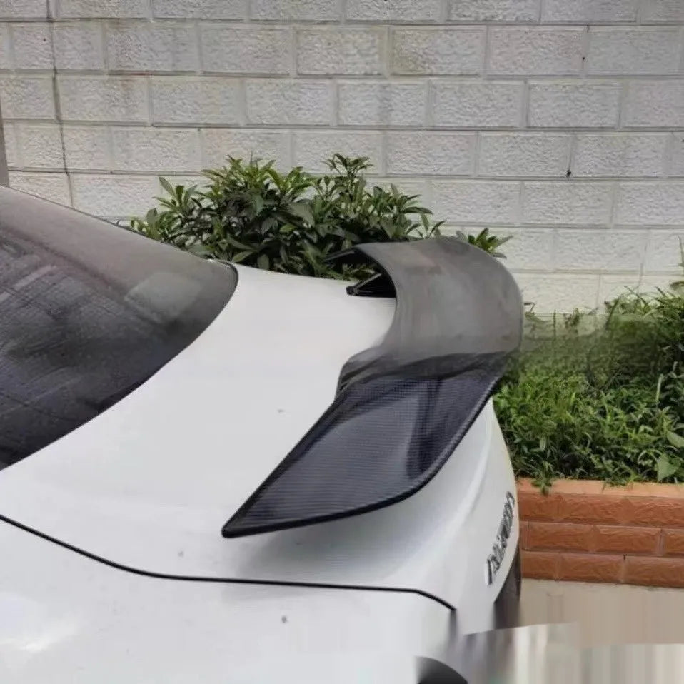 Universal punch-free ABS plastic car spoiler tail wing in a choice of finishes.