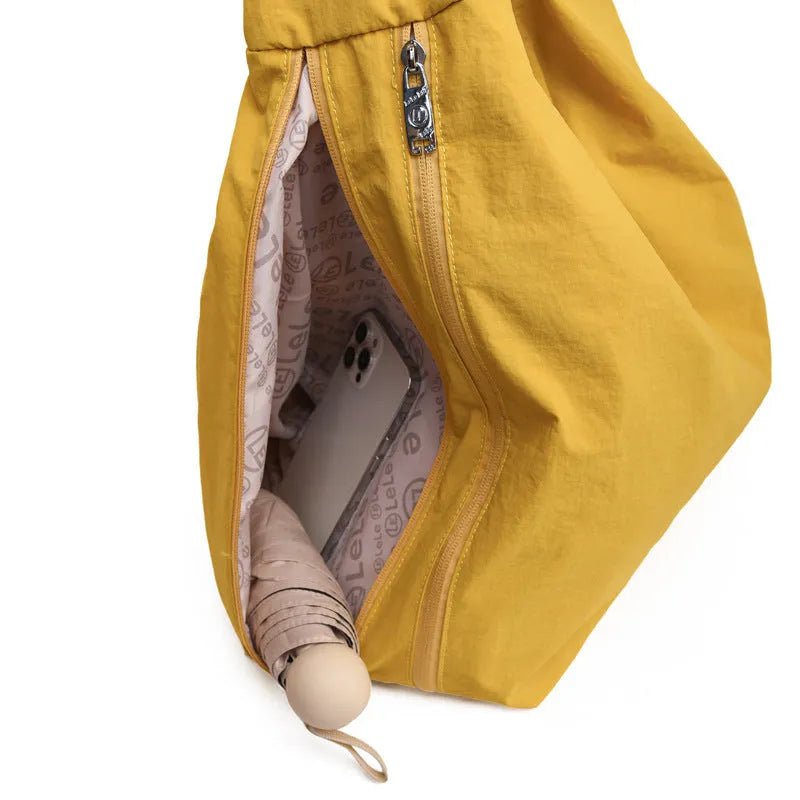 Women's heart-shaped underarm bag in nylon with large capacity, shown in available colours