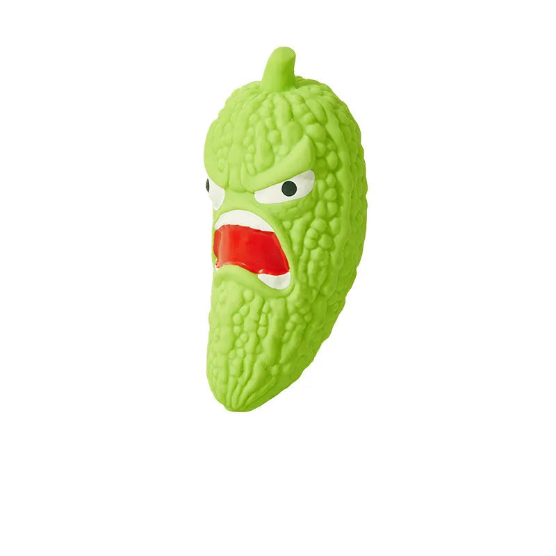 Vegetable-shaped dog chew toy in bitter melon and chili pepper designs with textured surfaces for dental cleaning