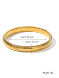 Women's titanium steel bracelet with vertical stripe ring pattern in gold colour
