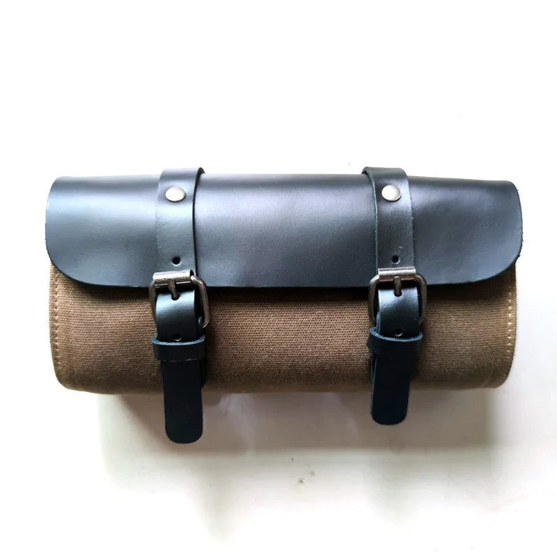 Khaki cotton Knight messenger bag showing front with rivets and internal organiser pockets.