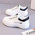 Women's white Korean-style leather pumps with cross-strap detailing and lace-up front
