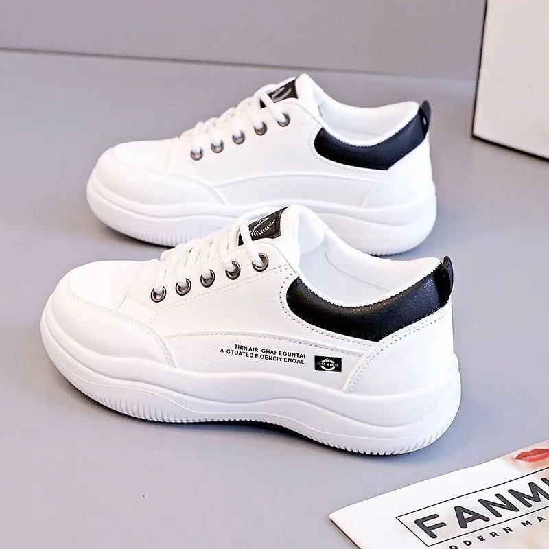 Women's white Korean-style leather pumps with cross-strap detailing and lace-up front