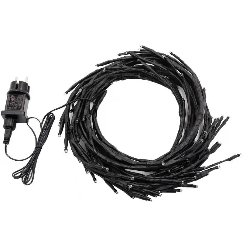 Flexible LED Christmas garland with vine branches and warm white lights for wall decoration