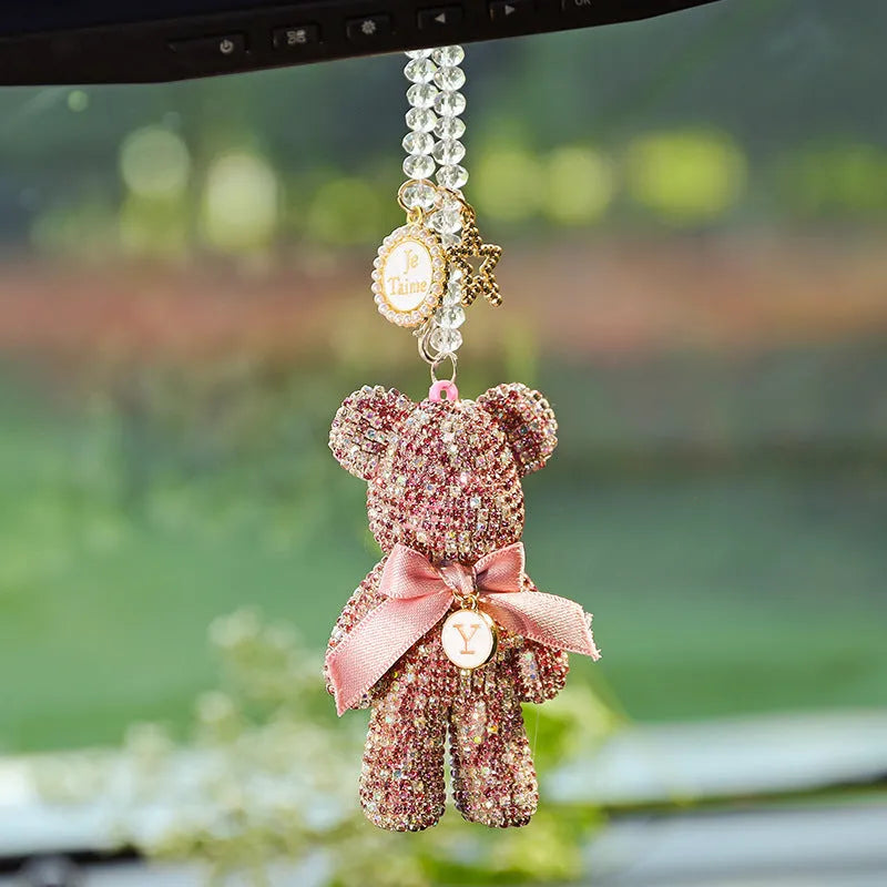 Diamond-embedded Violent Bear car rearview mirror pendant in black, white, and mixed pastel colours.
