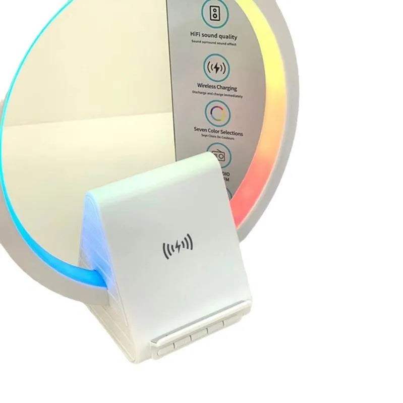 White rectangular smart device combining a wireless charging pad, Bluetooth speaker, and ambient light panel.
