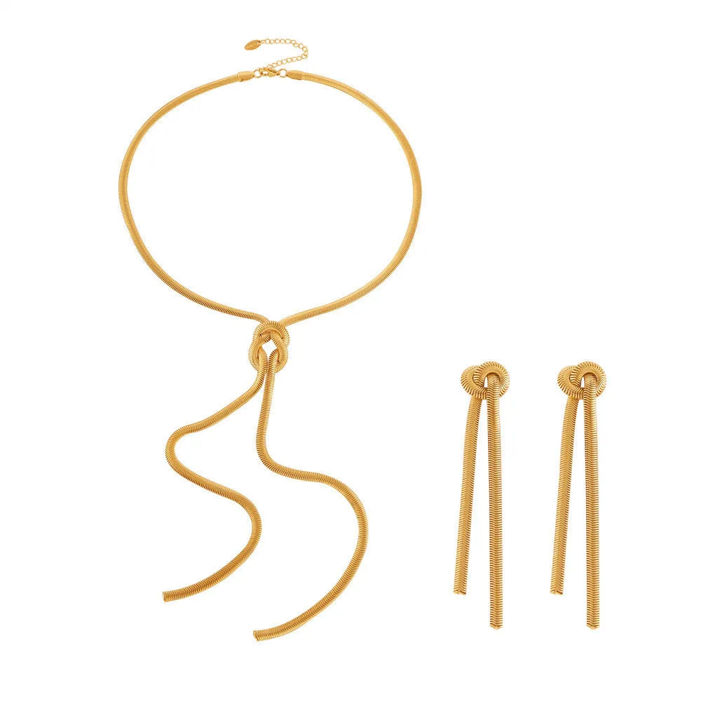 Gold knotted tassel pendant on titanium steel snake chain necklace with matching earrings