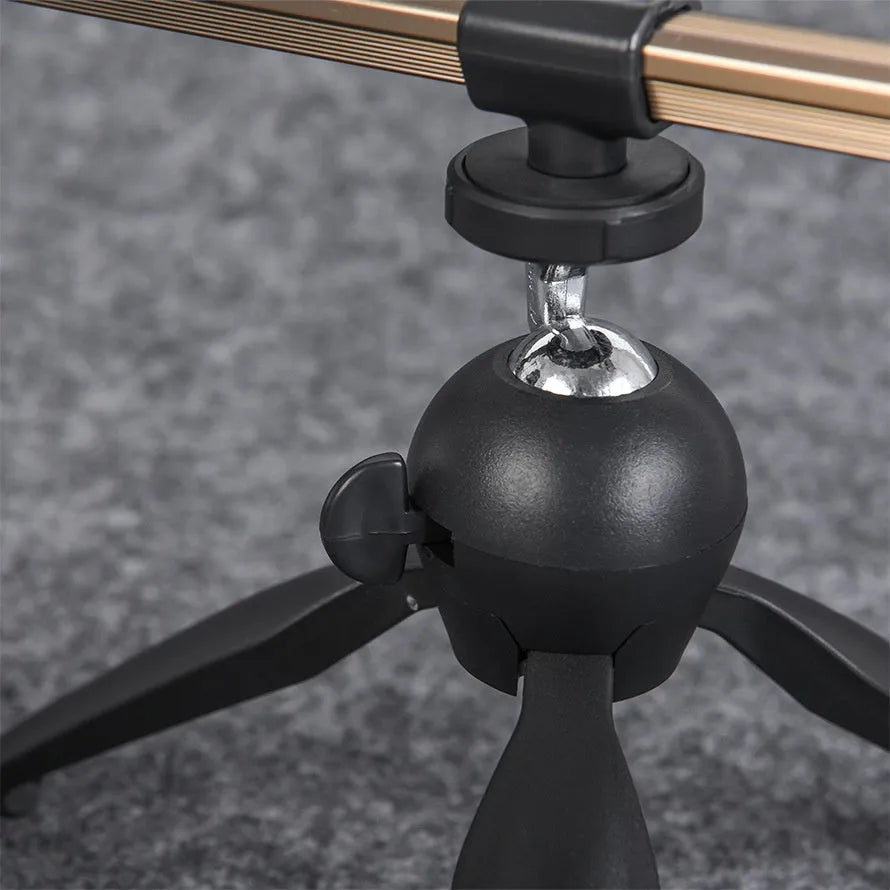 Aluminium alloy ice fishing rod holder bracket in a portable tripod design.