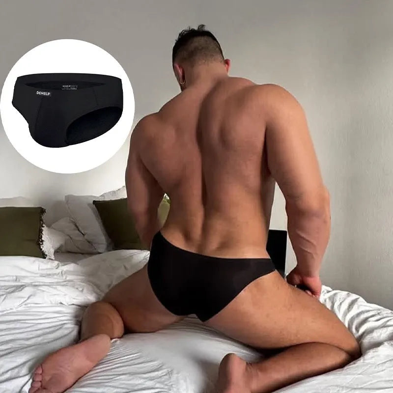 Men's solid colour low waist briefs in knitted polyester fabric on a white background.