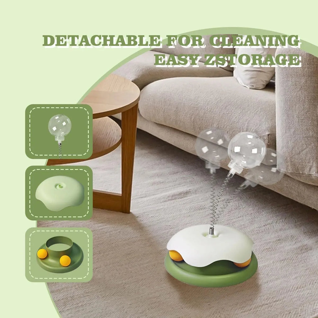 Blue and green interactive cat treat dispenser toy with a track ball for slow feeding and play.