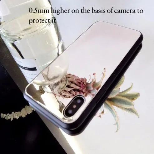 Black iPhone case with a reflective mirror surface on the back, compatible with iPhone X, 7, and 8 Plus.