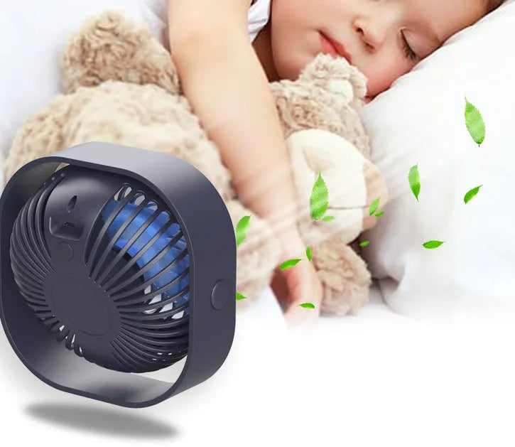 USB desk fan with rotating head in blue, showing rotary switch and compact alarm clock style.