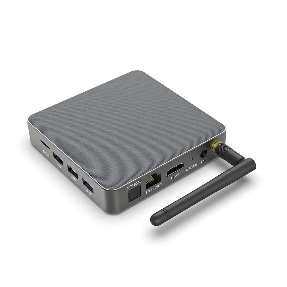 Compact black Android TV box with remote control and HDMI cable for 8K streaming