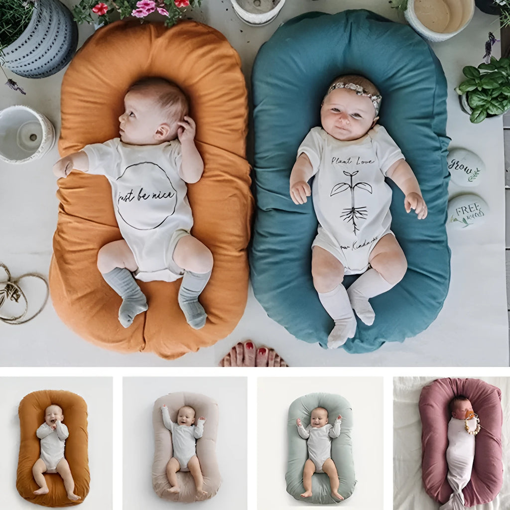 Beige portable cotton baby nest bed crib for newborns, measuring 75 cm by 45 cm.