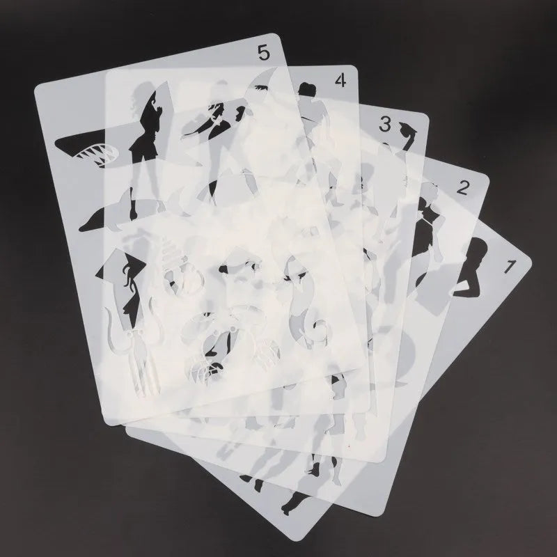 White plastic drawing stencil templates for tracing patterns and designs