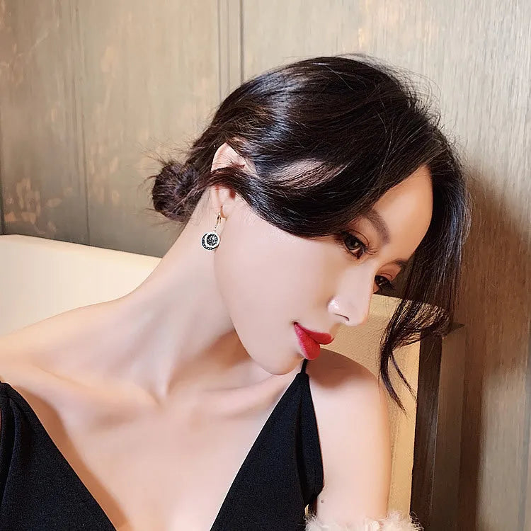 Black alloy geometric round earrings with retro Hong Kong style design measuring 3.6cm in length