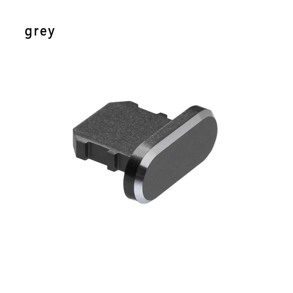 Aluminium alloy dust plug for iPhone charging port in various colours including gold, silver, and rose gold.