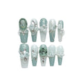 Green plastic women's armour suit with camellia gradient chain design and bow/butterfly patterns