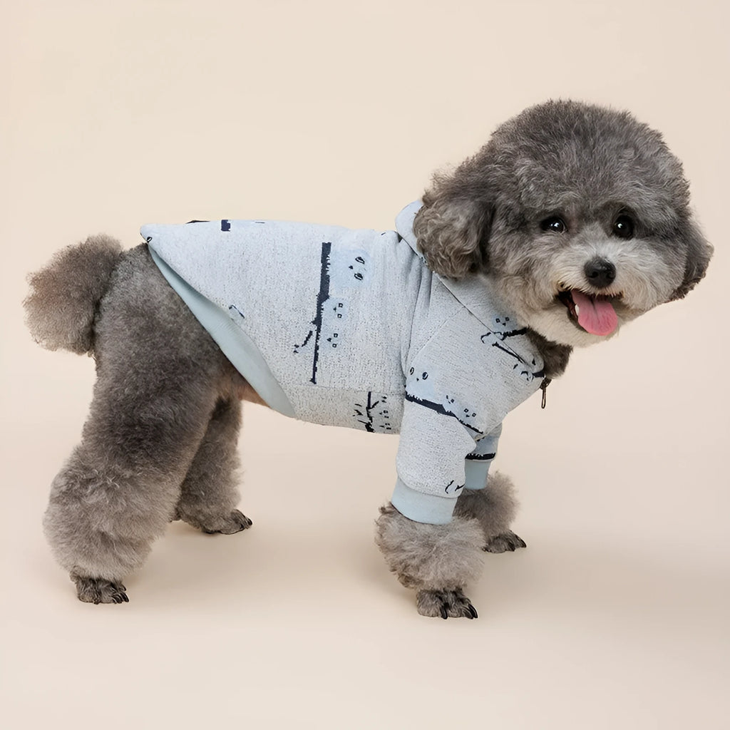 Blue cotton dog sweater with front zipper closure on model dog