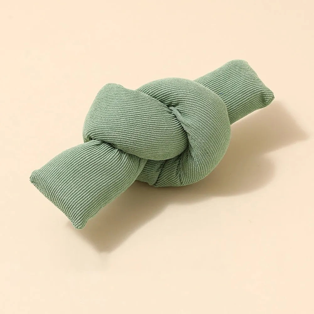 White knotted cotton rope dog toy for tug of war and chewing