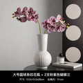 White ceramic vase with striped ball design in American country style for table decoration