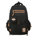 Large black nylon backpack for middle school students with curved shoulder straps and street style sewing details