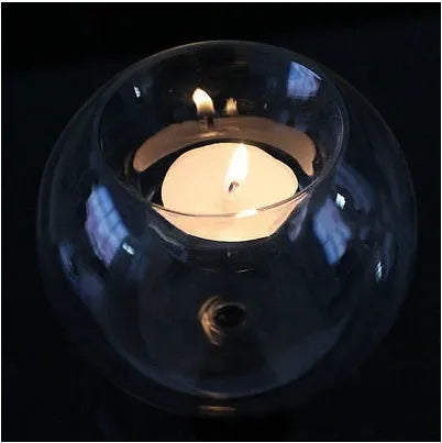 Clear round handmade hollow glass candle holder in three size options