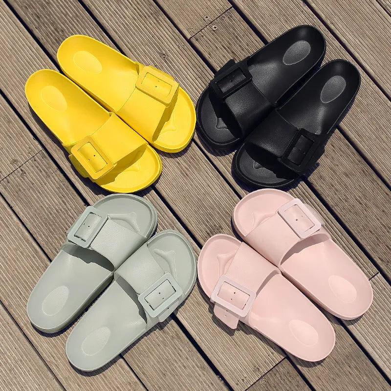 Women's grey blue buckle closure slipper sandals with soft EVA sole on a plain background.