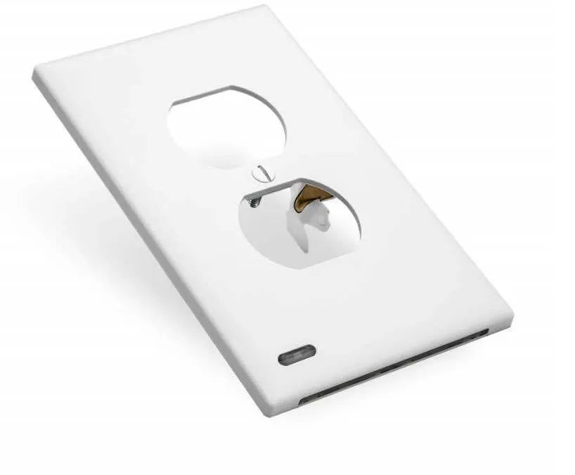 White plug-in LED night light with automatic sensor installed in wall socket