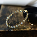 14K gilded women's bracelet with 6mm blue moonstone centrepiece and starry sky metal detailing