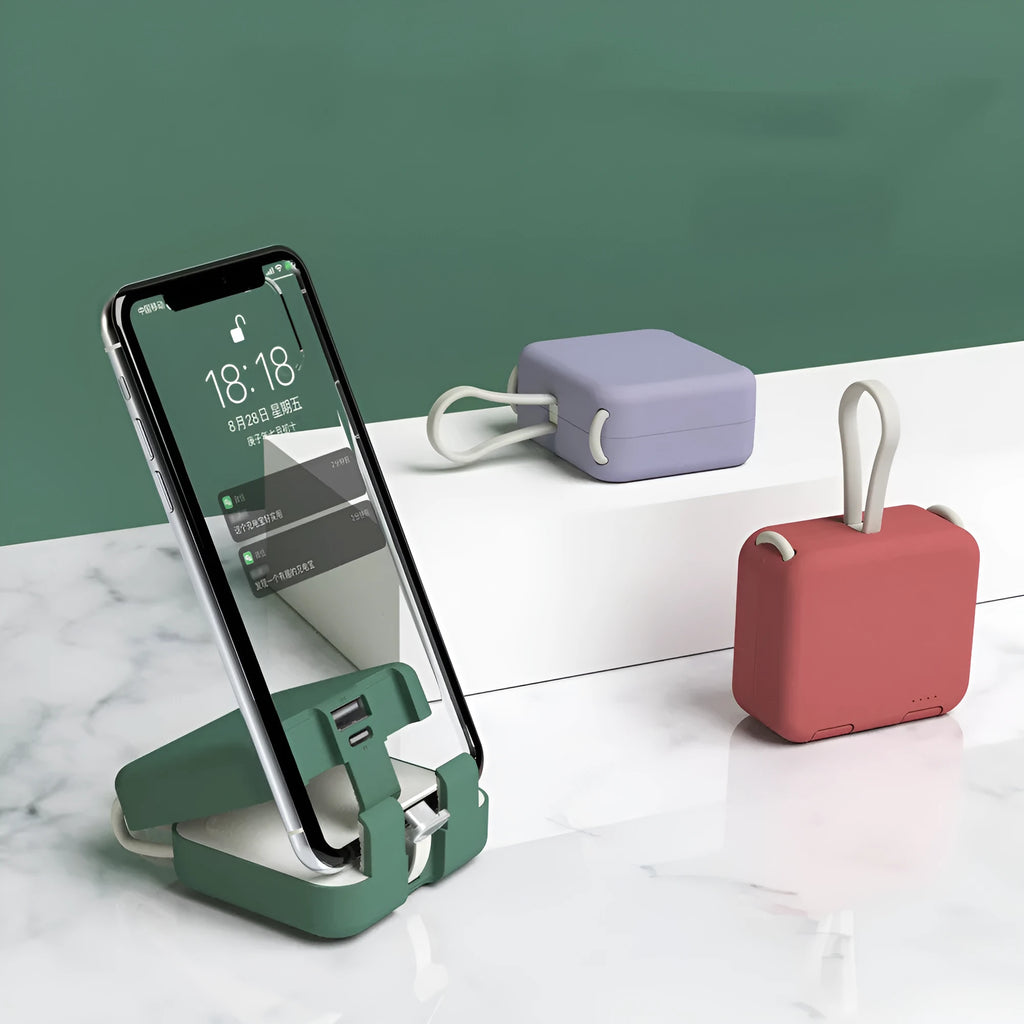 Handbag clip-on power bank in blue showing phone stand function and Type-C/Lightning ports.