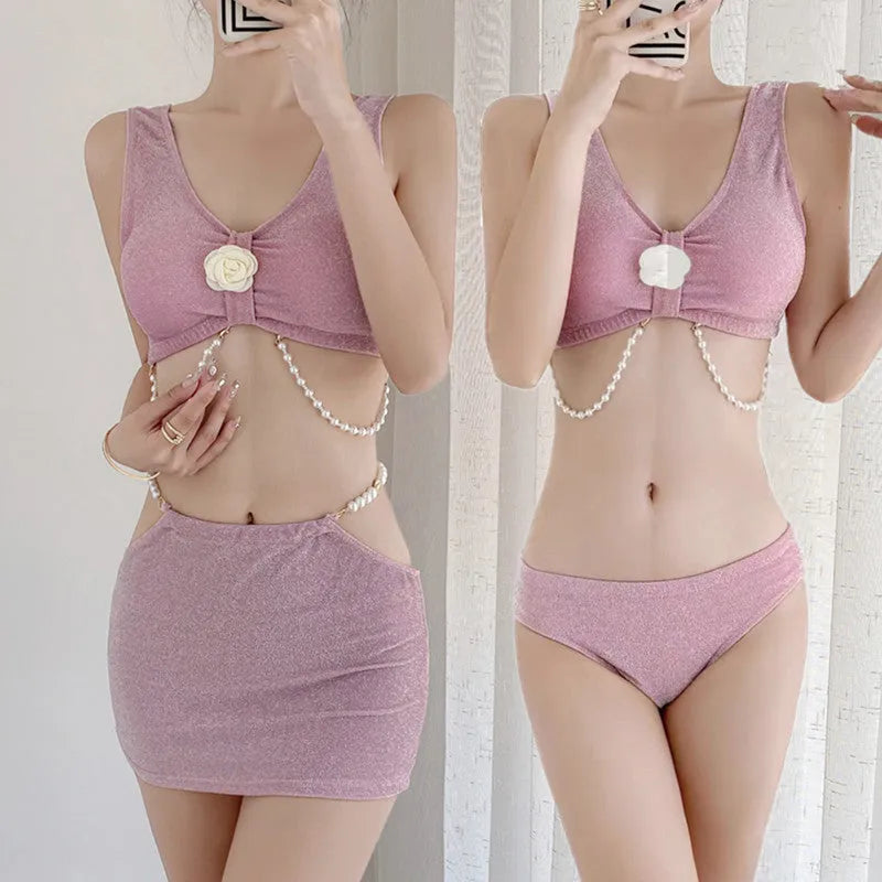 Women's three-piece bikini swimsuit set in pink and black colours with briefs style bottoms