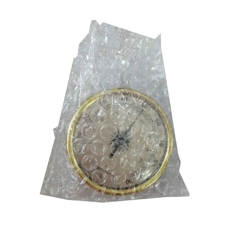 Analogue thermometer and hygrometer with aluminium outer ring and dial