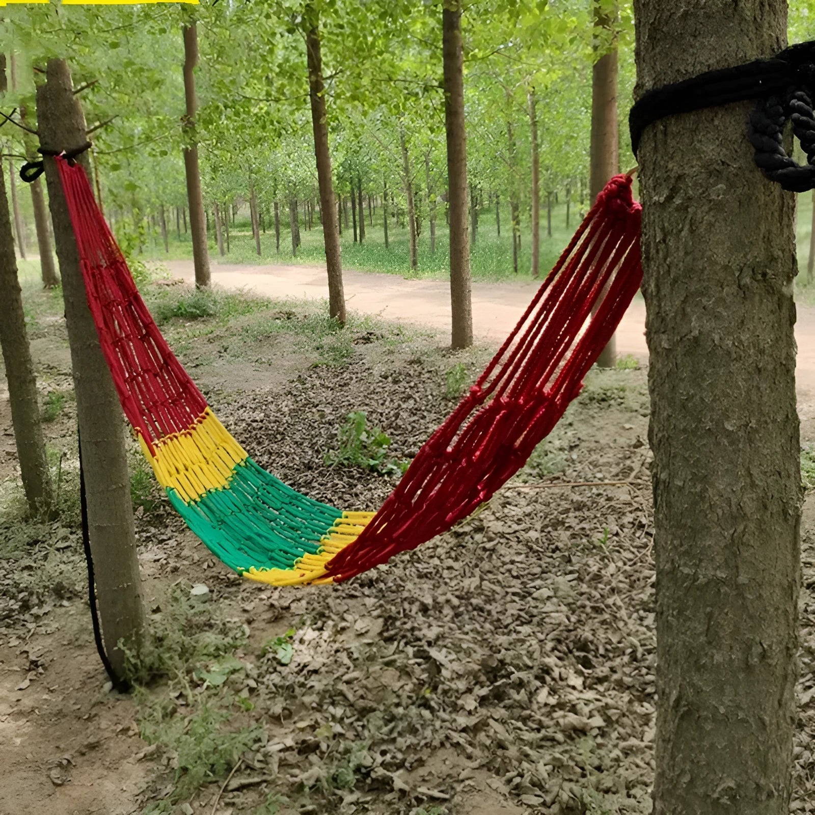 Nylon rope mesh hammock measuring 1.1m wide by 2.1m long with bold pattern design