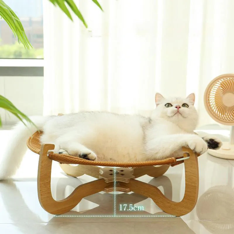 Brown woven rattan pet hammock bed measuring 46cm square with crib-style sides