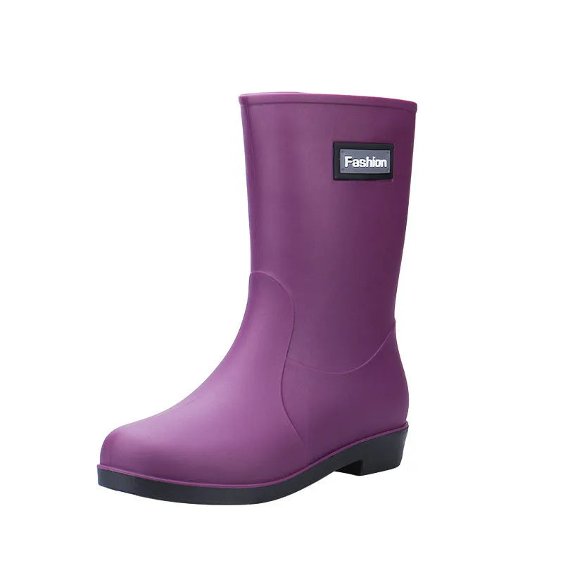 Women's mid-calf PVC rain boots in black with low heel for waterproof work footwear