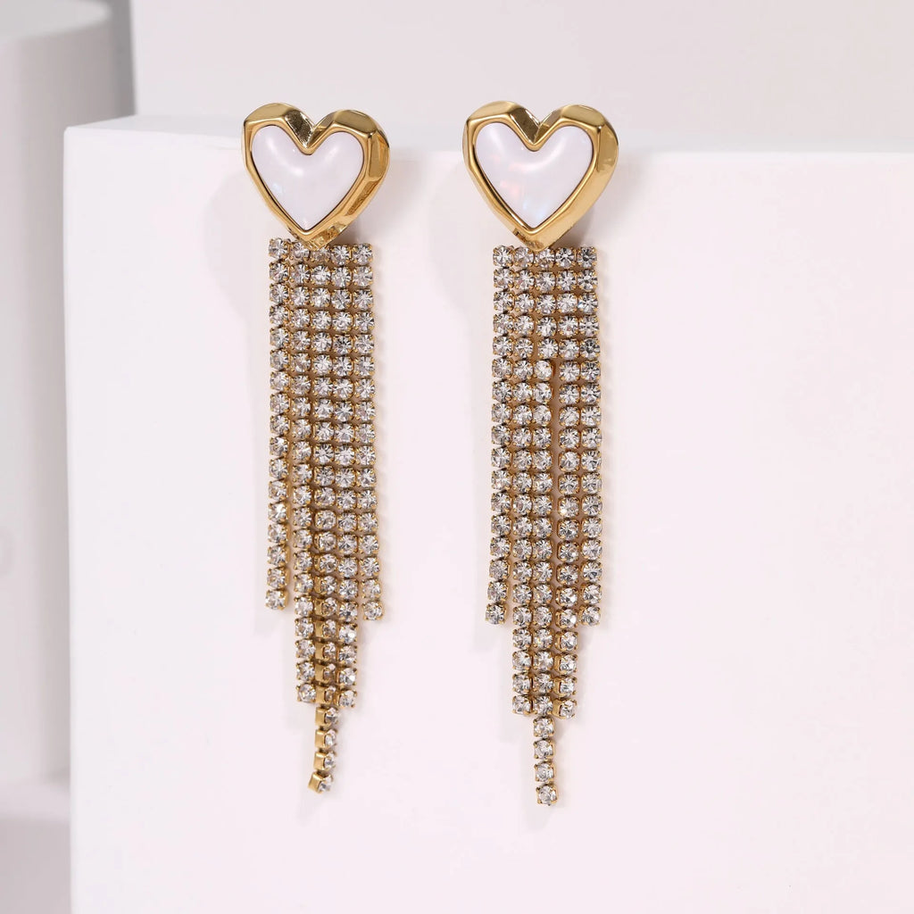 Women's stainless steel drop earrings with heart shape, star charm and diamond tassel detailing in 18K electroplated finish